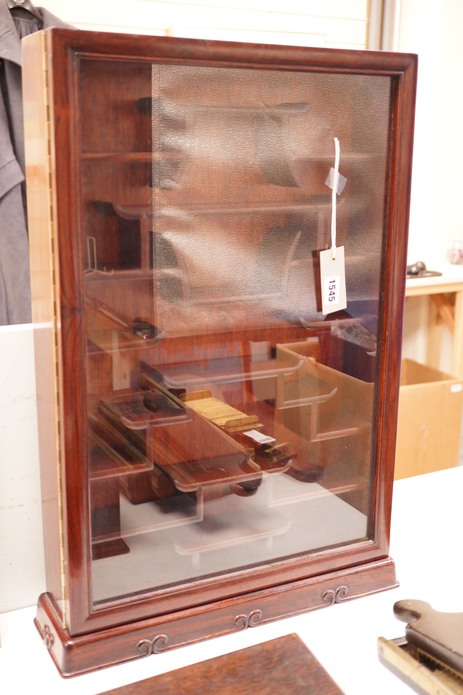 A Chinese hongmu and hardwood snuff bottle cabinet, 63x40x10cm